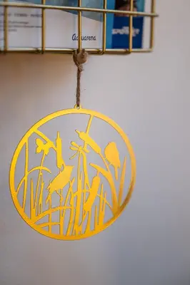 a sign hanging on a wall with animals on it at Haus Lasaun in Bressanone