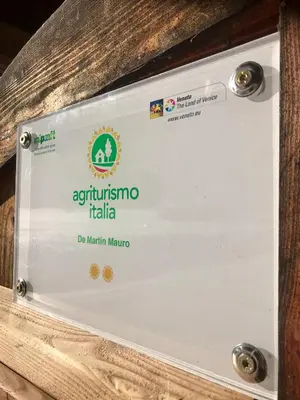 a sign that says aquarium trieste italia on a wooden drawer at Agriturismo Maso Fumas in Canale dʼAgordo