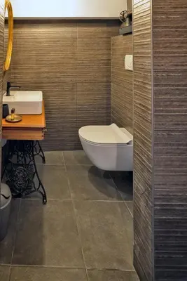 a bathroom with a toilet and a sink and a tub at Il Florino in Merano