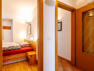 a building in a village in the mountains at Apartment Cesa Pra da Molin-2 by Interhome in Campitello