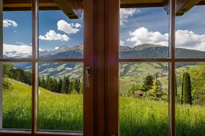 a window view of a mountain view from a house at Nestlhof in Racines