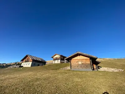 a group of buildings on top of a hill at Sturmhof in Chiusa