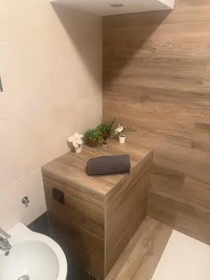 a bathroom with a sink and a toilet and a tub at Samy s Home 1 FREE parking Wi-Fi in Bolzano