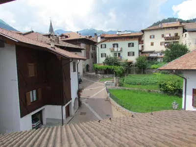 a view of a town with buildings and a street at Appartamenti Rumo in Rumo