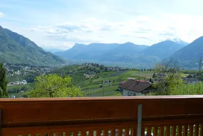a view of a valley from a balcony with mountains at Garni Sonnleiten in Tirolo