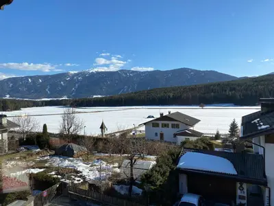 a view of a house with snow on the ground at Haus Pfalzen - Casa Falzes in Falzes