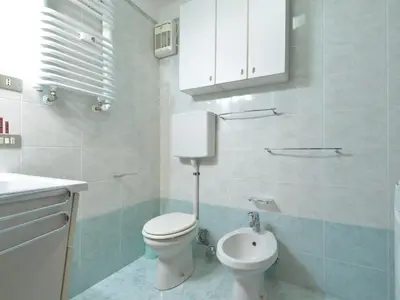 an open door to a bathroom with a toilet at Apartment Condominio al Parco-2 by Interhome in Canazei