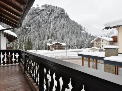 a balcony with a view of a mountain at Apartment Cesa Fraines-3 by Interhome in Alba di Canazei