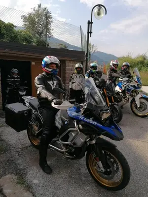a group of motorcyclists are sitting on their motorcycles at B&B SEGONZANO in Segonzano