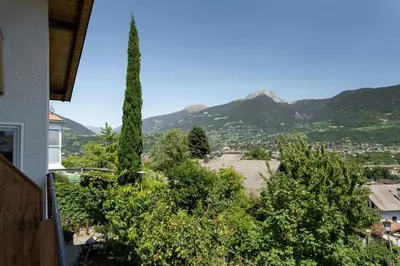 a view of the mountains from a house at MeranoView Apartments in Marlengo
