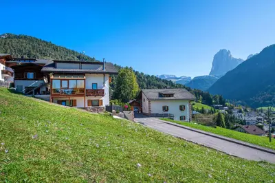 a house on the side of a hill at Apartment Sellablick in Ortisei