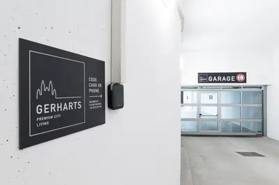 a sign on a wall next to a door at Gerharts Premium City Living - center of Brixen with free parking and Brixencard in Bressanone