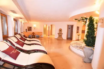 a large room with a row of chairs in it at Residence Palmai in Ortisei