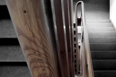 a close up of a wooden stair railing at Casa al Sole in Ortisei