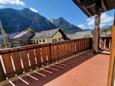 a balcony with a view of the mountains at Solaia in Mazzin