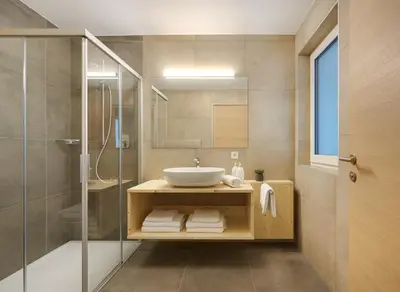 a bathroom with a sink and a shower at Ariala - Mountain Holiday Home in Falzes