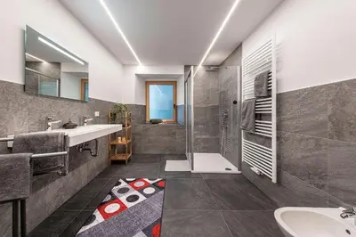 a bathroom with a sink and a shower at Blasighof in Quinzo
