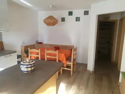 a kitchen with a stove and a counter top at Ca DaSa in San Lugano