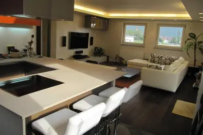 a bathroom with a sink and a shower and a toilet at Relax Suite in Merano