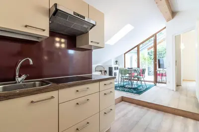 a kitchen with a sink and a counter top at Zweizimmer-Wohnung mit Schlossblick in Chiusa