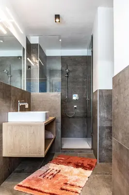 a bathroom with a sink and a shower at Garni Wieterer in Terlano