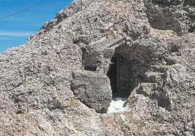 a cave in the side of a rocky mountain at Monte Pelmo in Alleghe