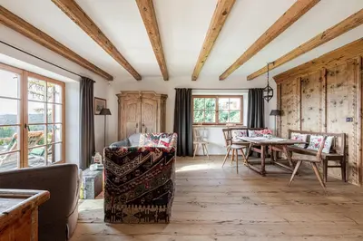a living room with a table and chairs at Haus Sophie in Longomoso