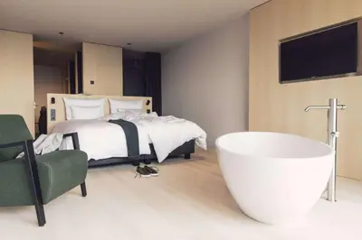 a bathroom with a sink and a shower at Hotel Milla Montis in Maranza