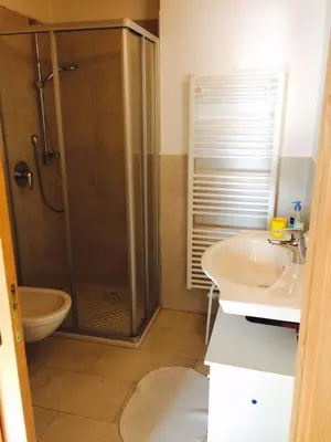 a bathroom with a shower and a sink at La terrazza gardenese in Santa Cristina in Val Gardena