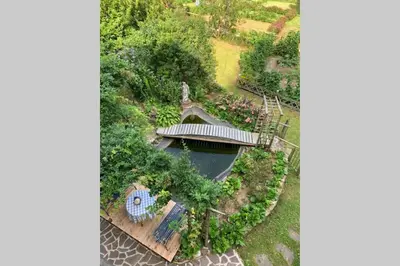 an aerial view of a house with a garden at Paola’s Country Home - Vanoi Primiero Trentino in Canale San Bovo