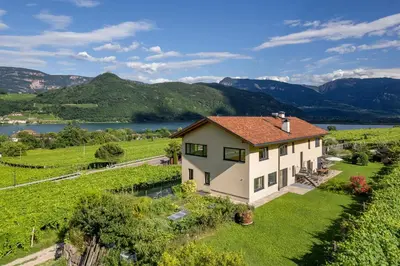 an aerial view of a house in a vineyard at Rösslhof in Caldaro