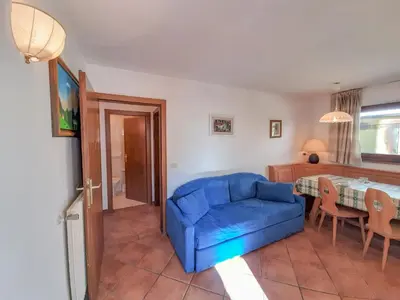 a building with snow in front of it at Apartment Roacia-2 by Interhome in Alba di Canazei