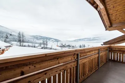a winter view from the balcony of a cabin at Rauchenbichlerhof in Brunico