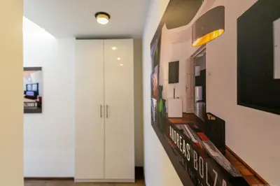 a hallway with a white door in a room at Apartment Mulino in Merano