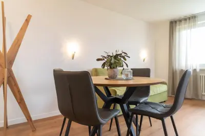 a dining room with a table and chairs at Residence Haus Heinrich in Montagna