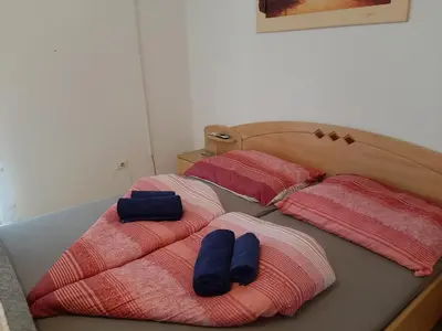 two beds with pillows on top of each other at Merano Panoramablick ruhig gelegen in Merano
