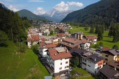 an aerial view of a village in the mountains at Condominio Le Coste in Falcade
