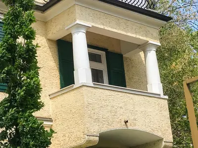 a building with a window on the side of it at villa Mays in Merano