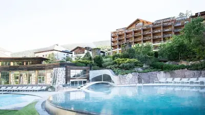 a rendering of a hotel with a swimming pool at Adler Spa Resort Balance in Ortisei
