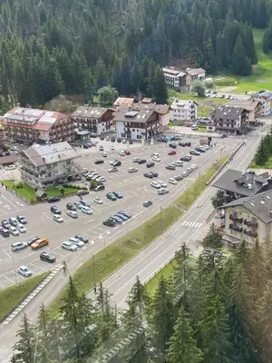 an aerial view of a parking lot in a town at Casa Doleda in Alba di Canazei