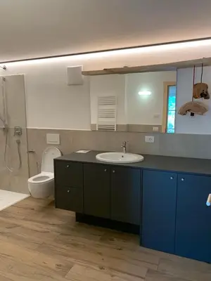 a bathroom with a sink and a toilet and a mirror at Castell Matscher in Bressanone