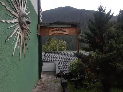 a sign on the side of a building with aificantificantificantificantificantificant at Alpen Ferienwohnung Ill in Lappago