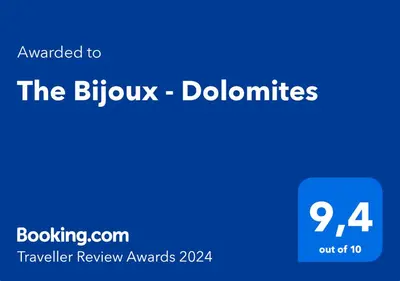 a blue rectangle with the text awarded to the blubu doodirts at The Bijoux - Dolomites in Agordo