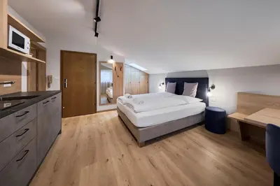 a bathroom with a sink and a shower at Apartment Steinach in Lagundo