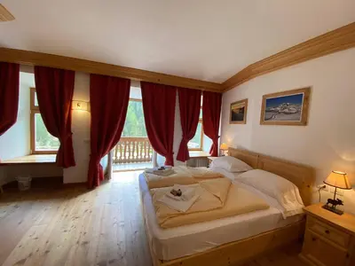 a bathroom with a sink and a toilet and a shower at Rifugio Ospitale in Cortina dʼAmpezzo