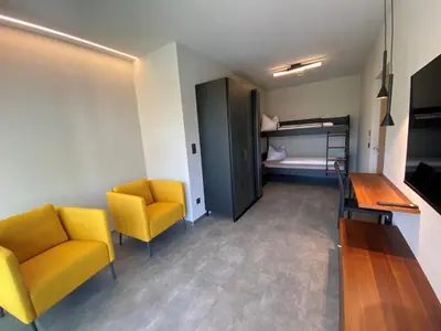 a living room with a couch and a table at Appartement Mayr in Parcines