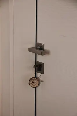 a door with a lock on the side of it at SAN ROMEDIO Agriturismo in Romeno