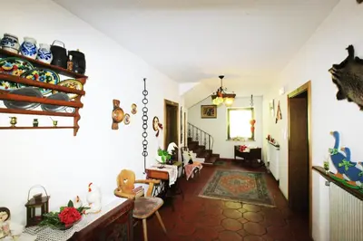 a hallway of a house with a dining room at Tannerhof Bed & Breakfast in Caines