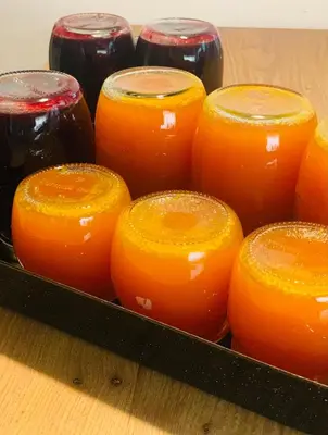 a group of orange candles sitting on a table at Tannerhof Bed & Breakfast in Caines