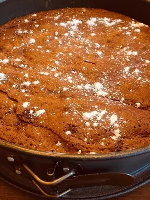 a cake sitting in a pan on a table at Tannerhof Bed & Breakfast in Caines